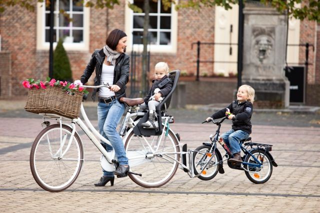 Acessórios para transportar crianças em biciclera